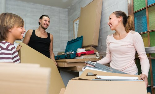 Man and van team preparing items safely for transport