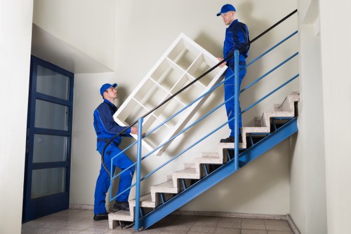 Professional removals planning in West Kensington with moving boxes and transport preparation