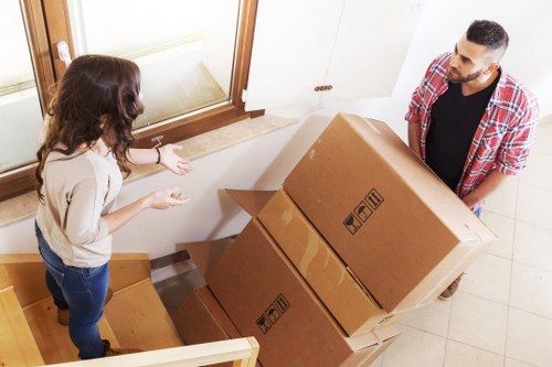 Loading furniture into a removal van for a West Kensington relocation